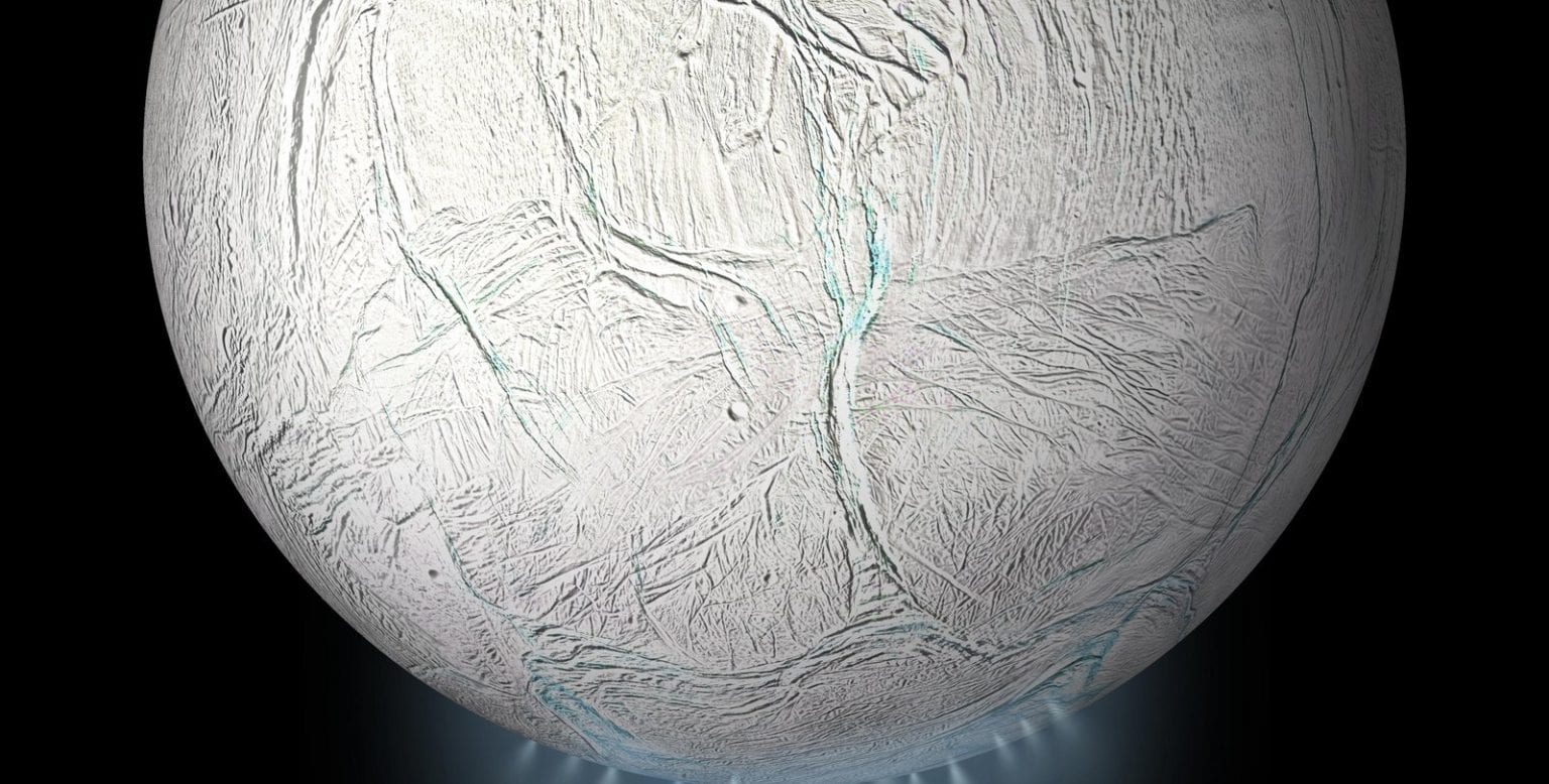 Enceladus with plumes visible at the bottom. Credit: NASA