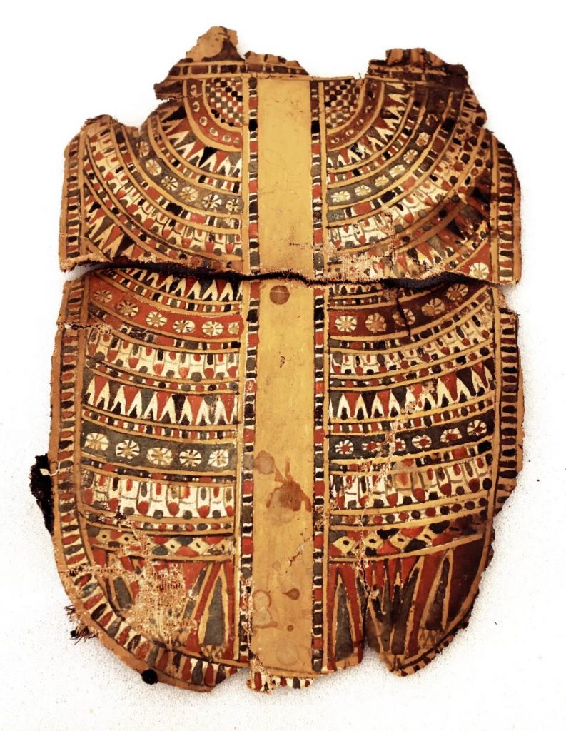 An incredible colorful cartonnage discovered inside a coffin. Credit: University of Milan