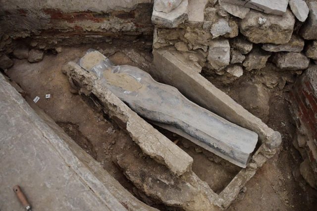 Lead human-shaped sarcophagus found in the foundation of the Notre Dame cathedral. Credit: Julien De Rosa/AFP