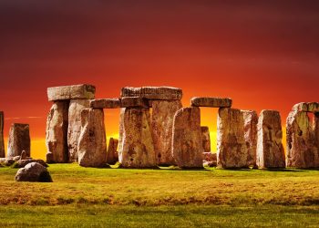 A photograph of Stonehenge at sunset. Image Credit: Depositphotos.