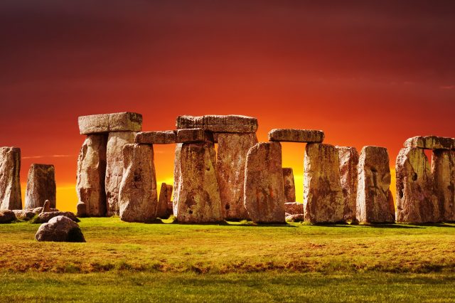 A photograph of Stonehenge at sunset. Image Credit: Depositphotos.