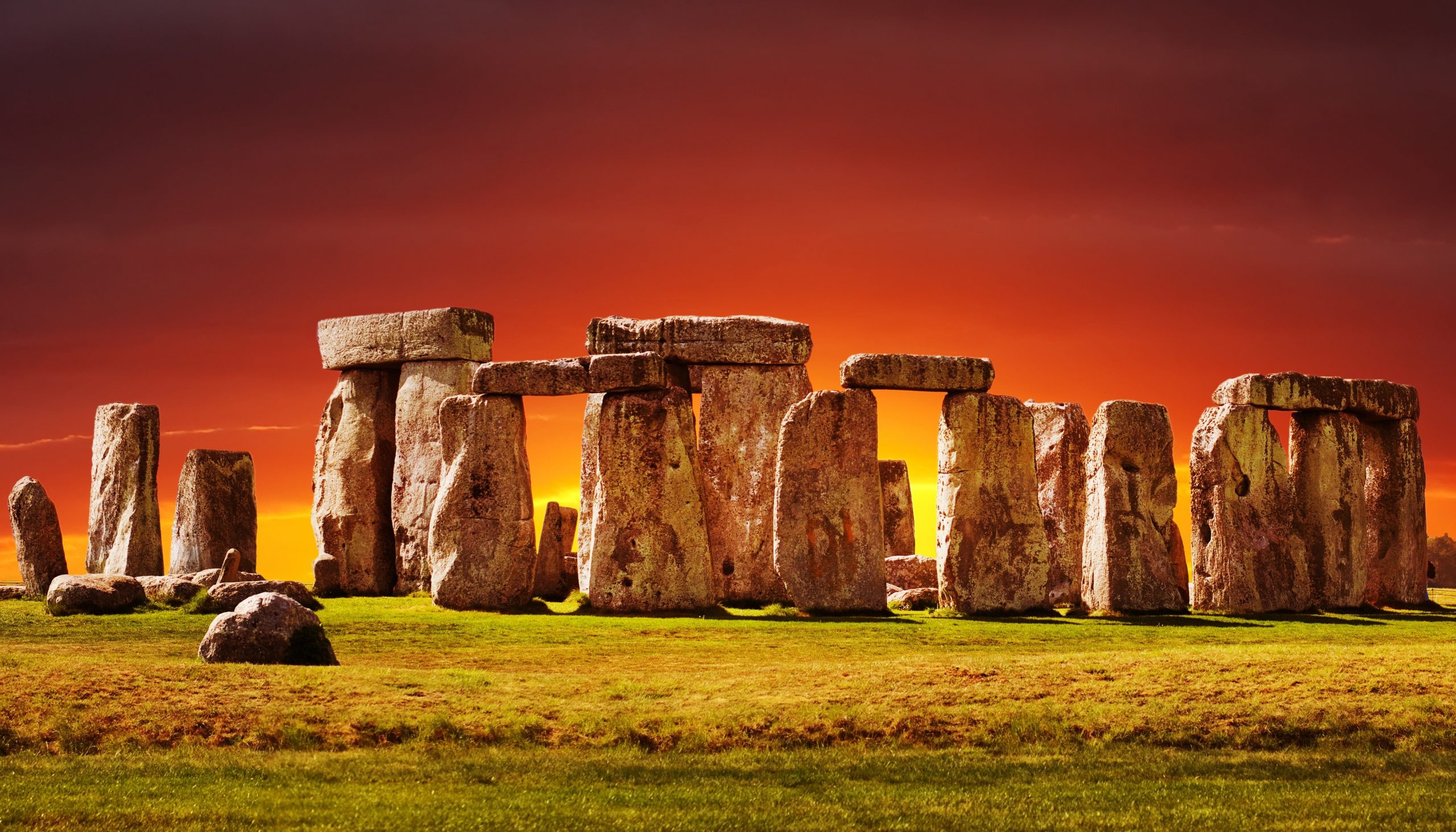 A photograph of Stonehenge at sunset. Image Credit: Depositphotos.