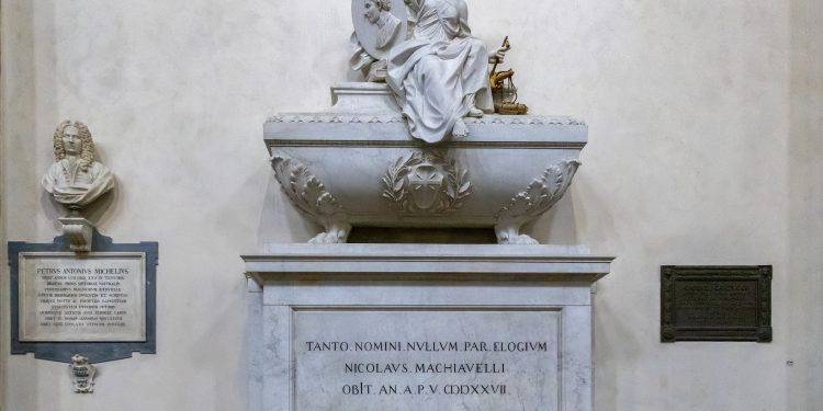 FLORENCE, TUSCANY/ITALY. Monument to Niccolo di Bernardo dei Machiavelli in Santa Croce Church in Florence. Depositphotos.