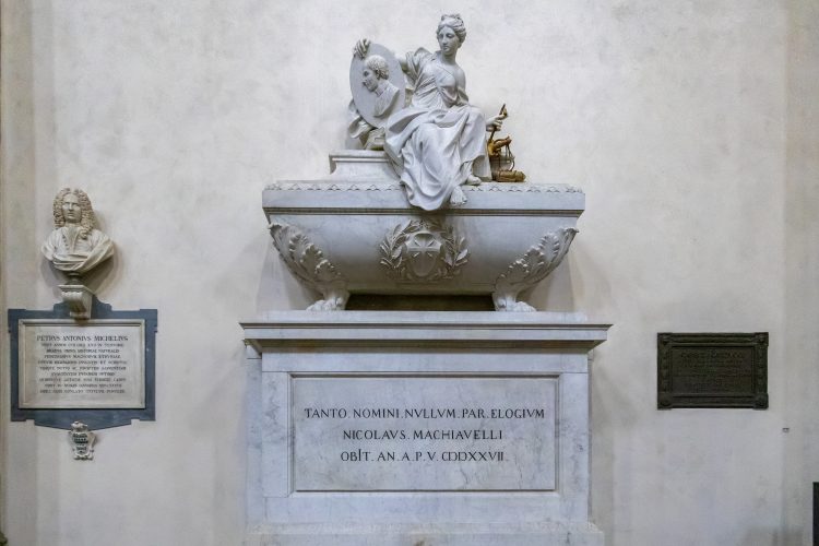 FLORENCE, TUSCANY/ITALY. Monument to Niccolo di Bernardo dei Machiavelli in Santa Croce Church in Florence. Depositphotos.