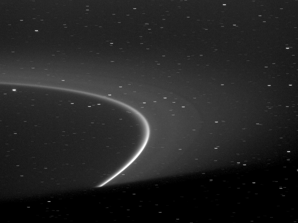 Shadow of Saturn on the G-ring. The arch near Aegaeon stands out brightly. Credit: NASA/JPL