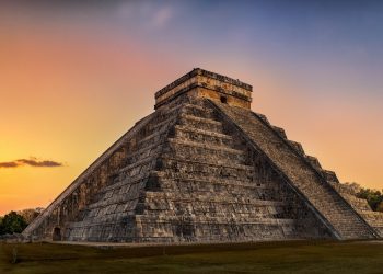 The ancient calendars that predicted the end of worlds. The ancient Maya pyramid of Chichen Itza at sunset. Depositphotos.