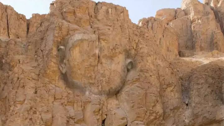 The massive carved face that resembles the Great Sphinx of Giza. Image Credit: C2.