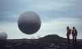 An artists rendering of a UFO and scientists studying it. Depositphotos.