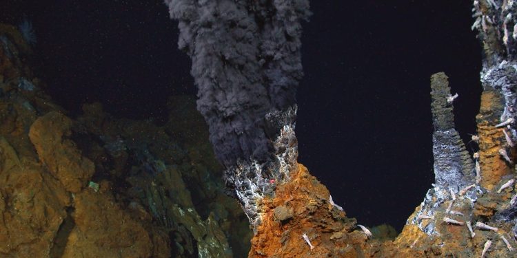 An image of an underwater hydrothermal vent. Image Credit: Woods Hole Oceanographic Institution.