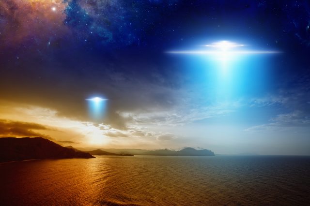 An illustration showing UFOs. Depositphotos.