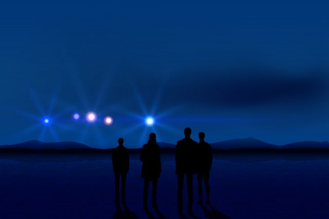 An illustration showing people seeing UFOs. Depositphotos.