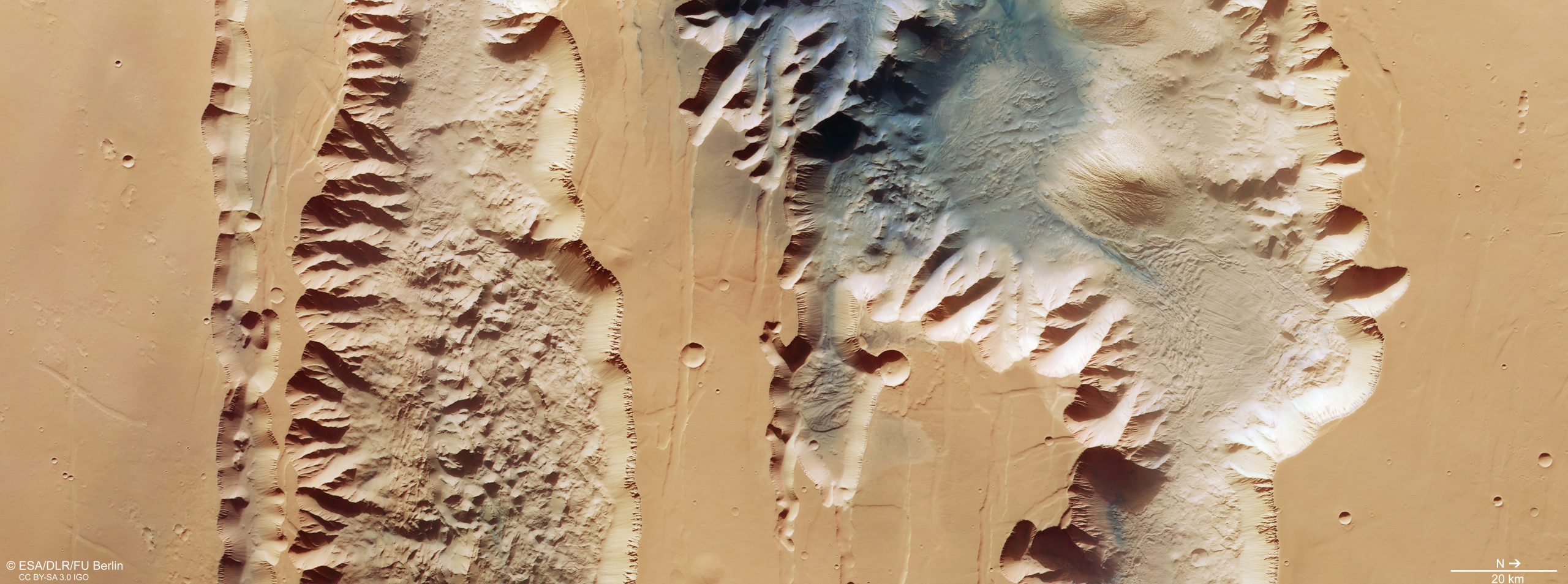 A photograph showing Ius and Tithonium Chasmata on Mars. Image Credit: ESA/DLR/FU Berlin, CC BY-SA 3.0 IGO.