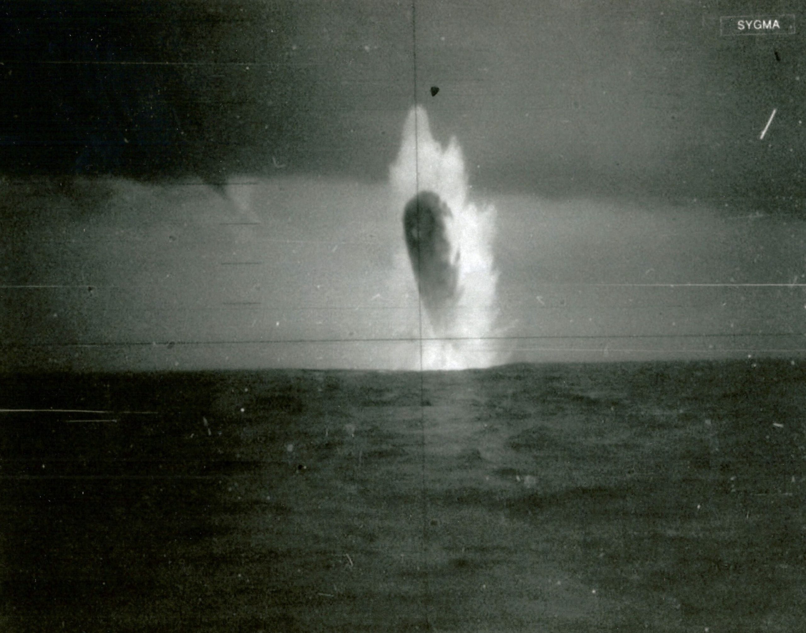 An alleged image taken by the USS Trepang showing a UFO existing the water. Image Credit: Ale Mistretta - The Black Vault. 