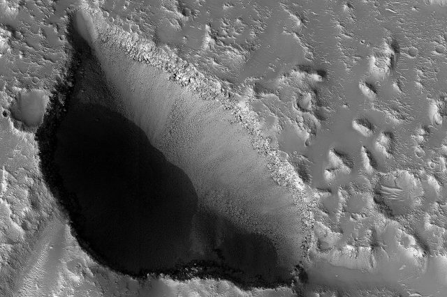 500-meter-deep Pit on Mars. Image Credit: NASA/JPL-Caltech/UArizona.