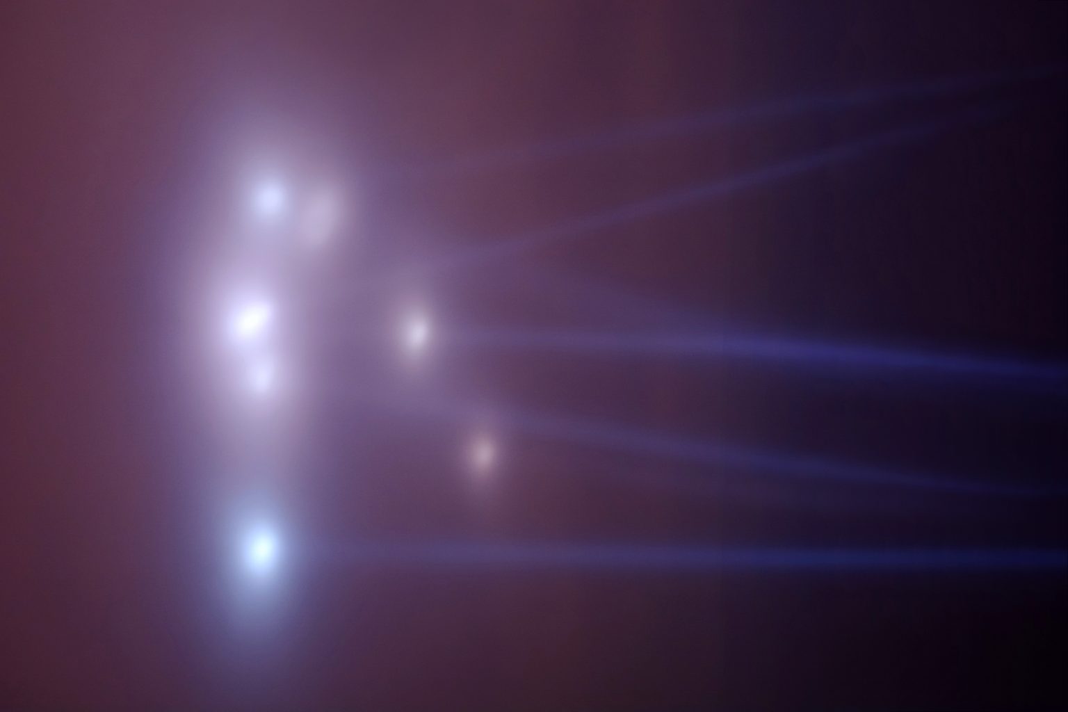 An illustration of a Black Triangle UFO With lights. Depositphotos.