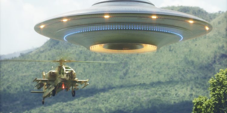 An illustration showing a military helicopter and a UFO. Depositphotos.