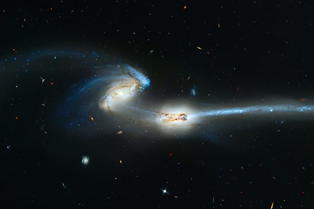 Colliding Galaxies in the constellation Coma Berenices. Depositphotos.