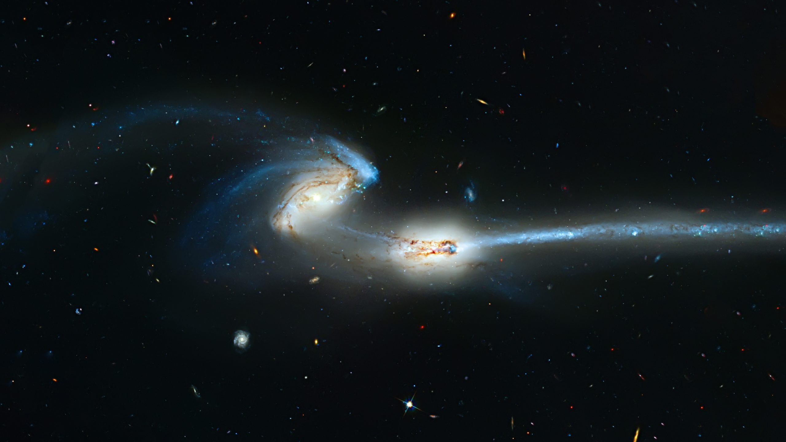Colliding Galaxies in the constellation Coma Berenices. Depositphotos.