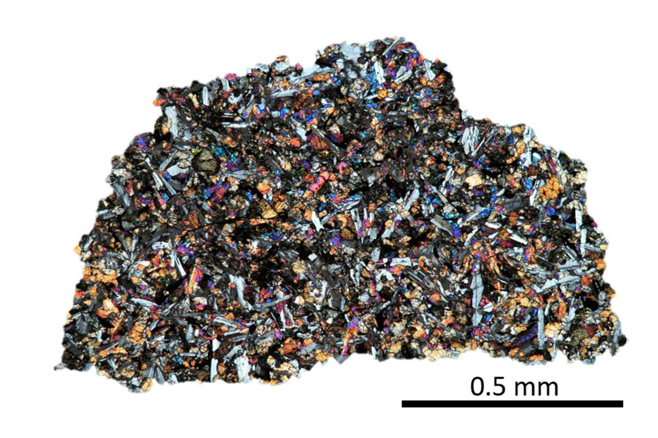 This thin section of NASA sample LAP 02436 contains indigenous noble gases found in Lunar Mare Basalt. Image type: optical microscopy, cross-​polarized light. Image Credit: ETH Zurich / Patrizia Will.