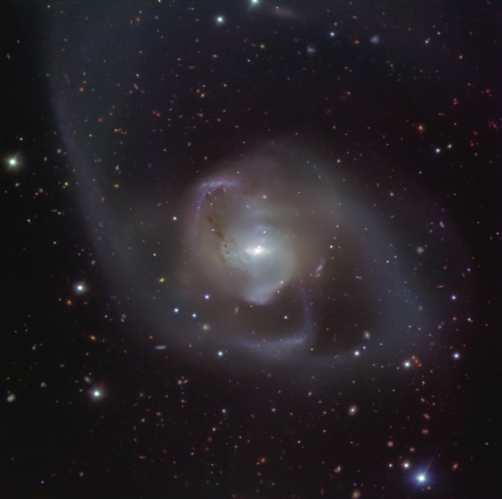 Around a billion years ago, two galaxies merged to form NGC 7727. NGC 7727's wispy shape is the result of a cosmic dance between two galaxies. Credit: ESO.