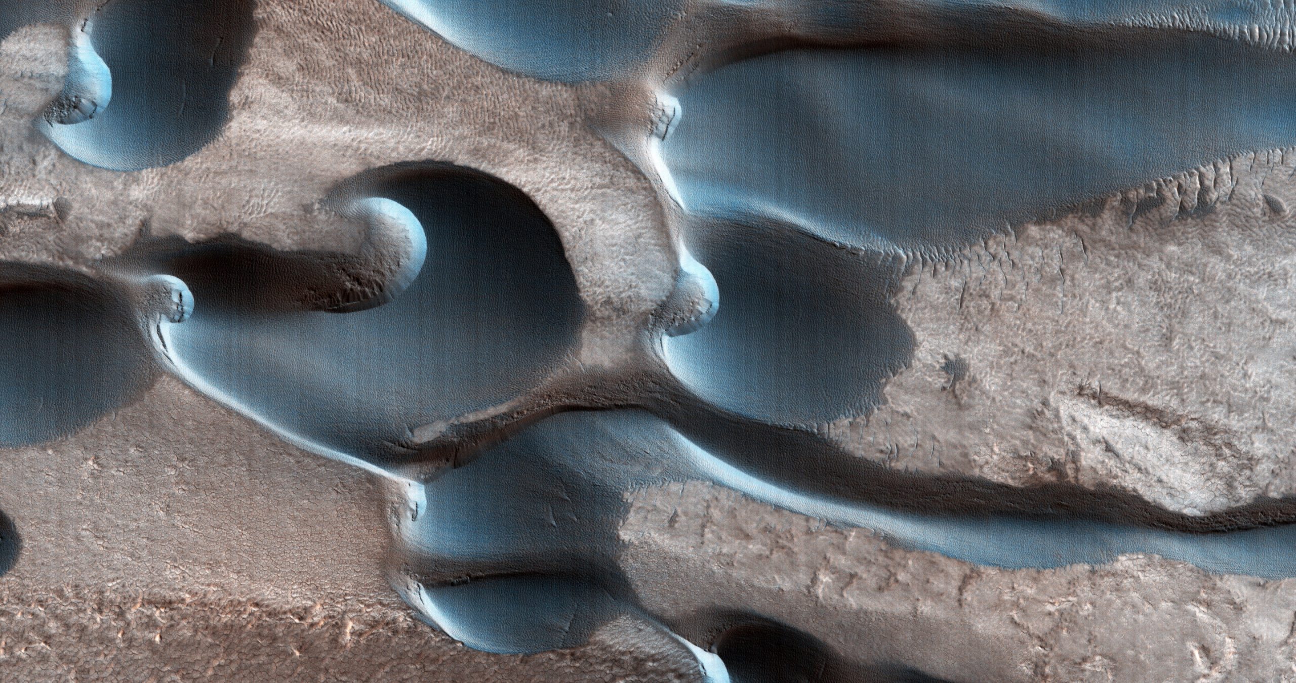 Martian dunes sculpted by wind. Credit NASAJPL-CaltechUArizona.