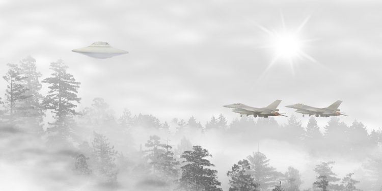 An illustration of a UFO being followed by fighter jets. Depositphotos.