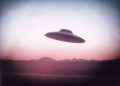 An illustration of a UFO flying saucer. Depositphotos.