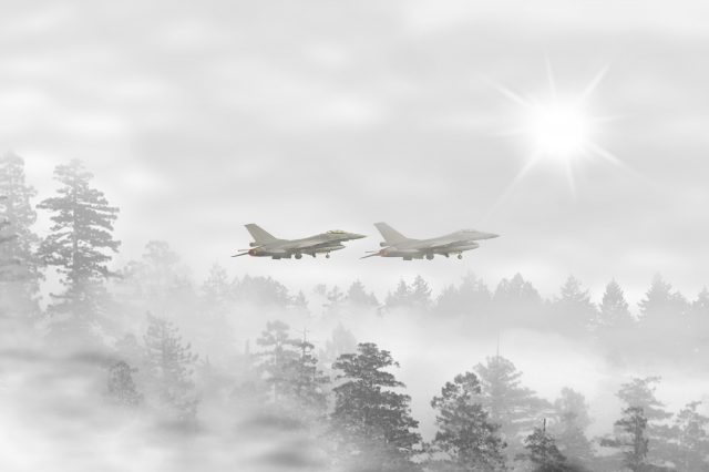 An illustration of fighter jets chasing a UFO. Depositphotos.