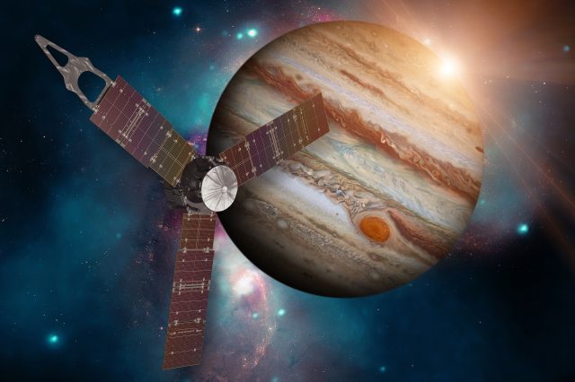 An illustration of the Juno spacecraft and Jupiter. Depositphotos.