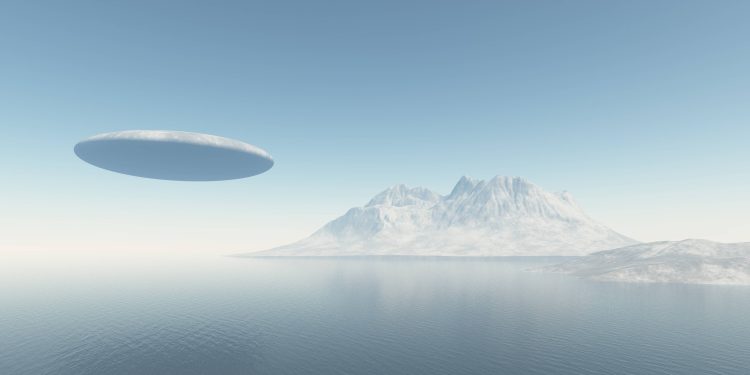 An illustration showing a UFO flying over the ocean. Depositphotos.