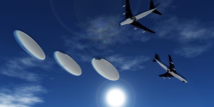 An illustration showing airliners encountering UFOs. Depositphotos.