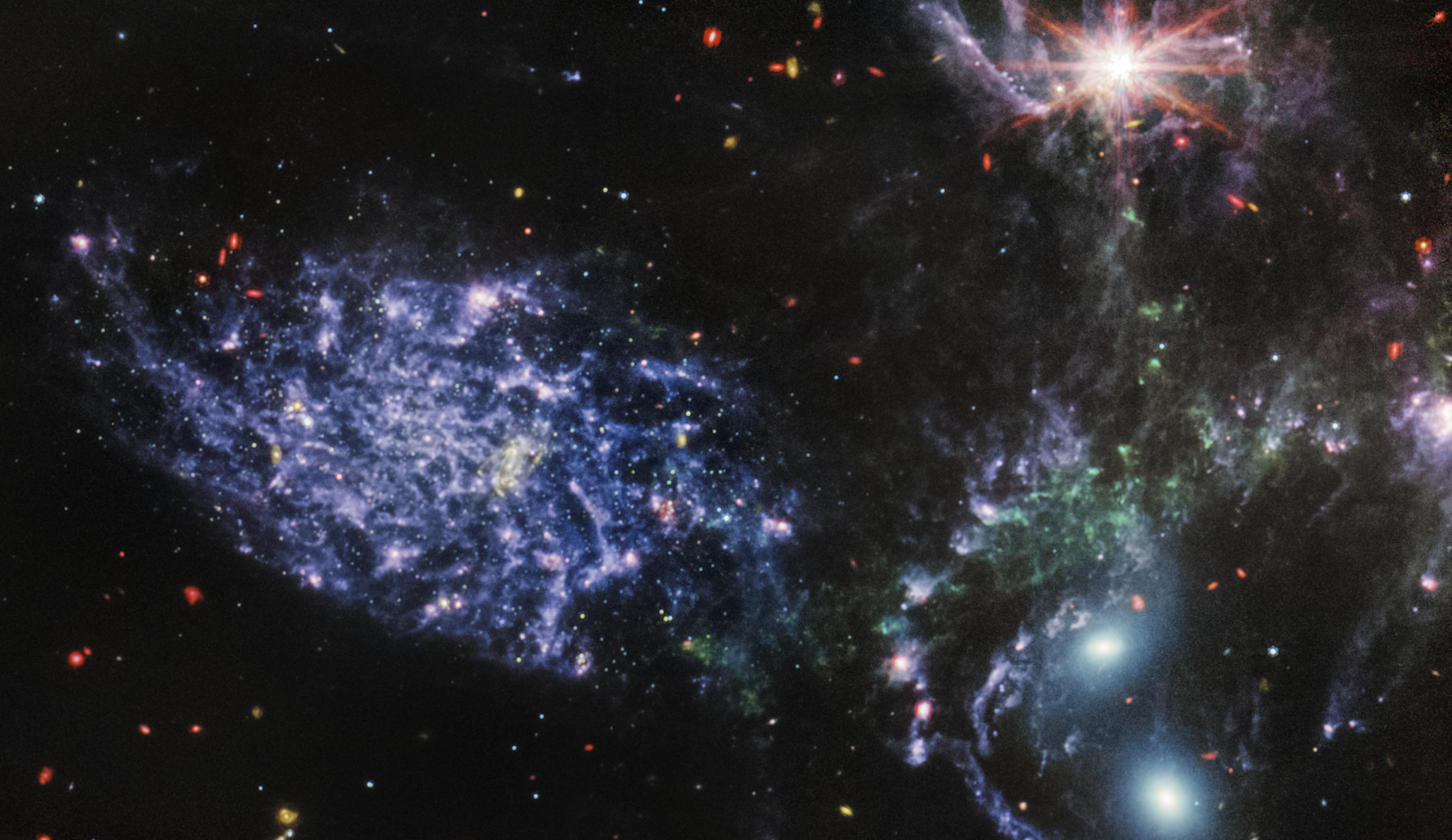 Mid-Infrared Instrument (MIRI) on JWST shows Stephan's Quintet in never-before-seen detail thanks to its powerful, mid-infrared vision. Credit: NASA, ESA, CSA, STScI.