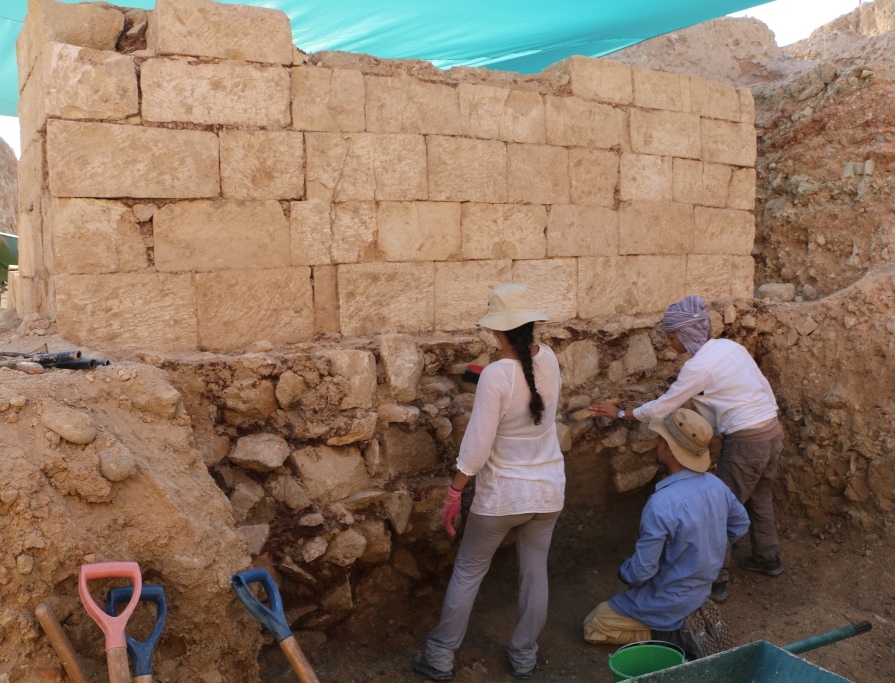A photograph of archaeologists excavating the monument. Image Credit: Department of Antiquities of the Republic of Cyprus.