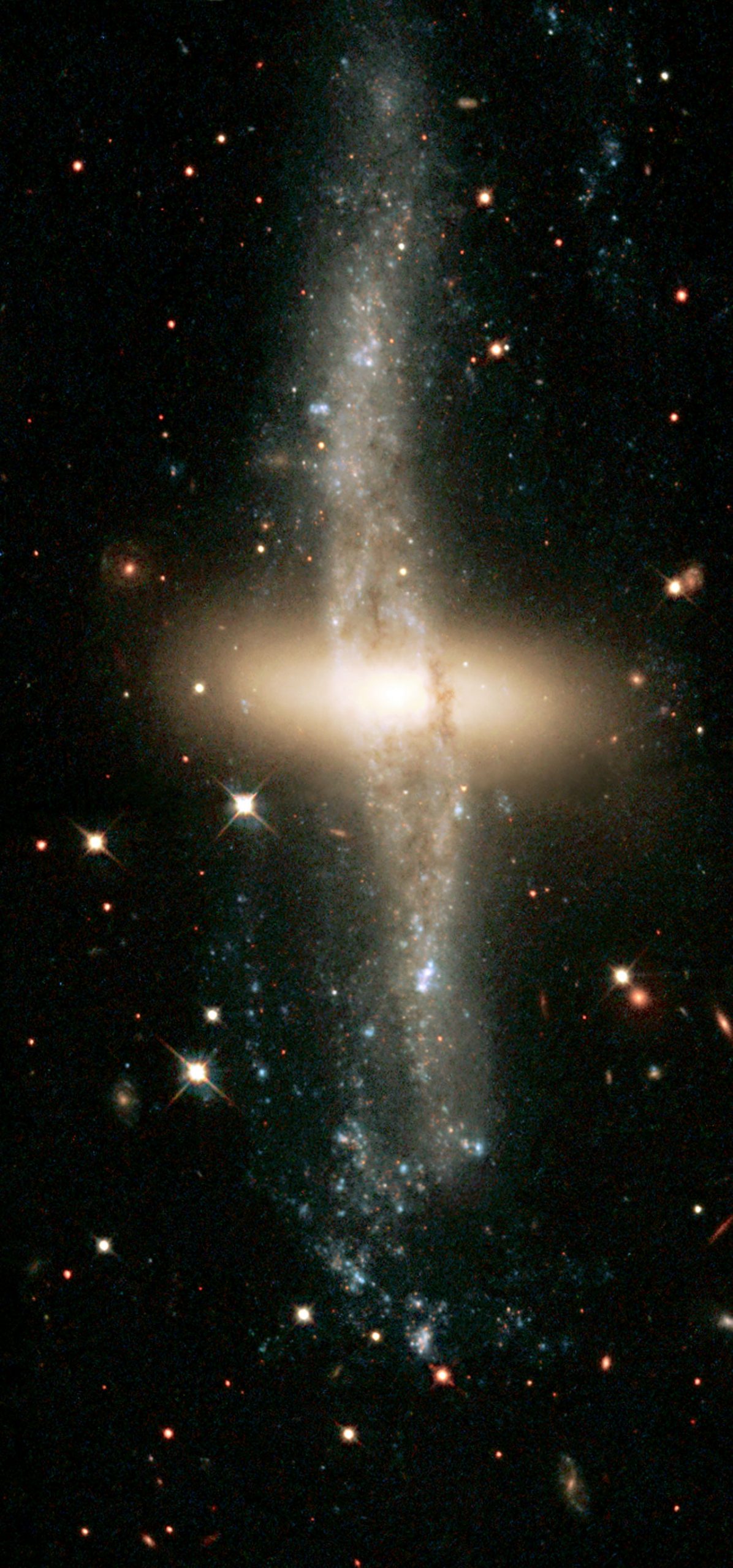 One of only 100 known galaxies with polar rings, NGC 4650A is located about 130 million light-years away. Credit: The Hubble Heritage Team (AURA/STScI/NASA/ESA).