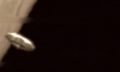 A screenshot of the alleged video showing a UFO flying near the Moon. Image Credit: Twitter/ Maussan.
