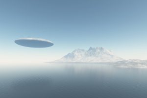 An illustration of a UFO flying over Antarctica. Depositphotos.