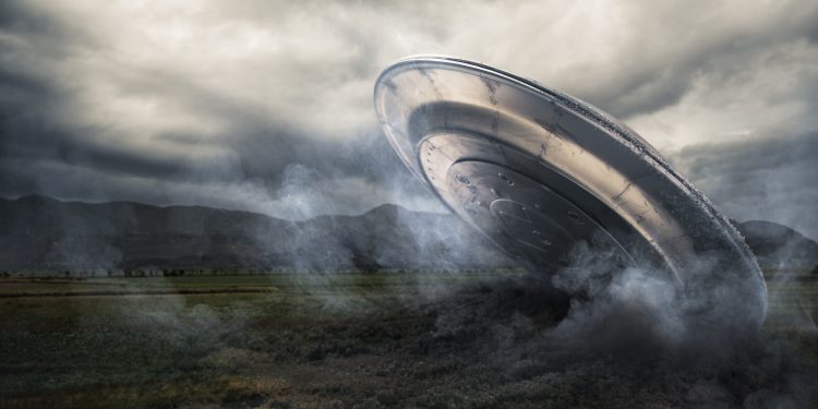 An illustration showing a crashed UFO. Depositphotos.