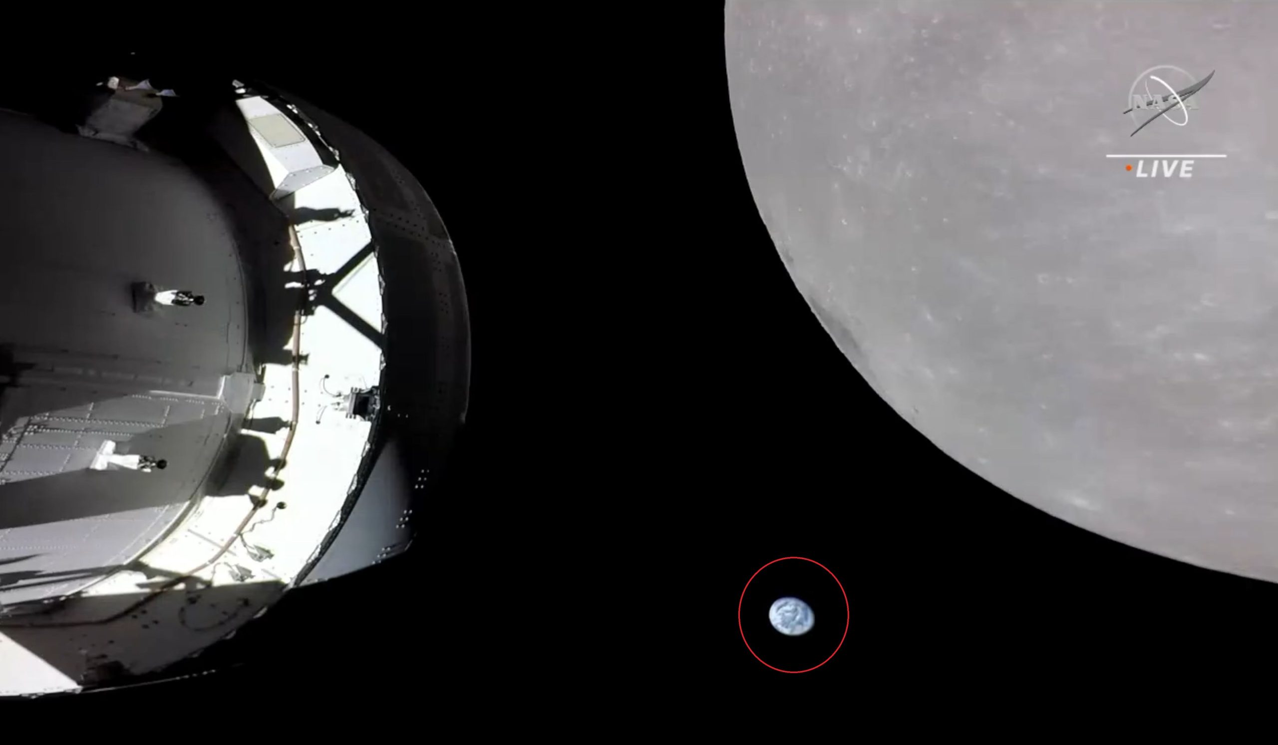A screenshot of the Orion spacecraft, the Moon, and Earth. NASA.