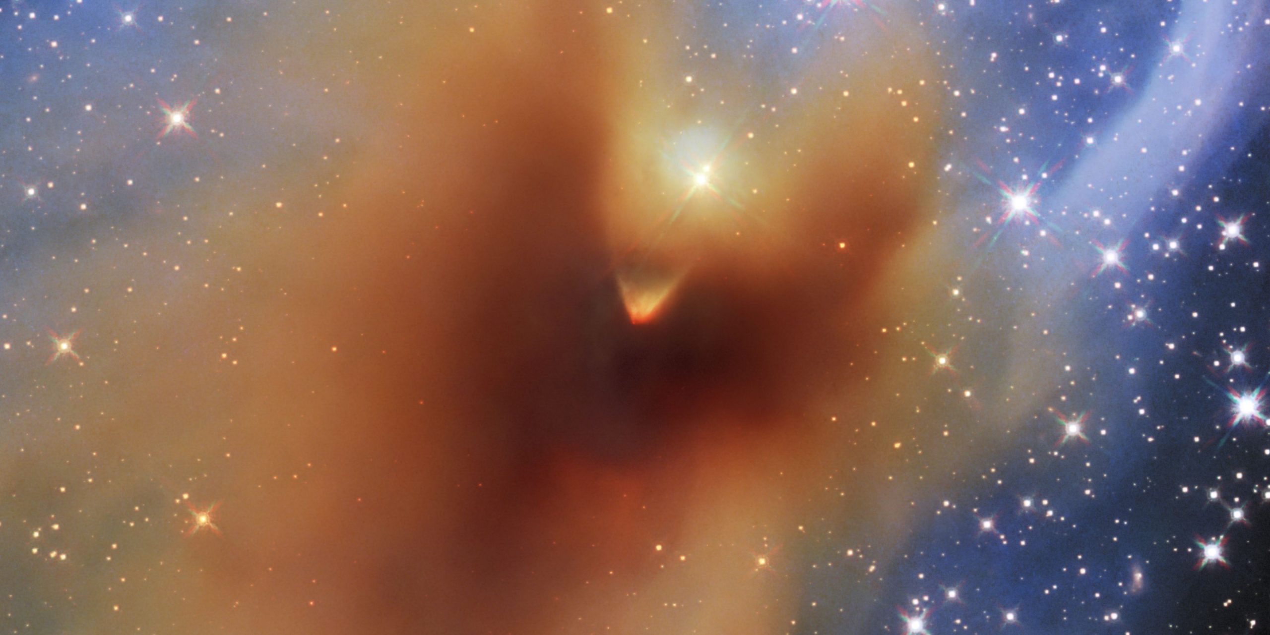 A cropped photograph of Hubbles view of CB 130-3. Image credit: ESA/Hubble, NASA & STScI, C. Britt, T. Huard, A. Pagan.