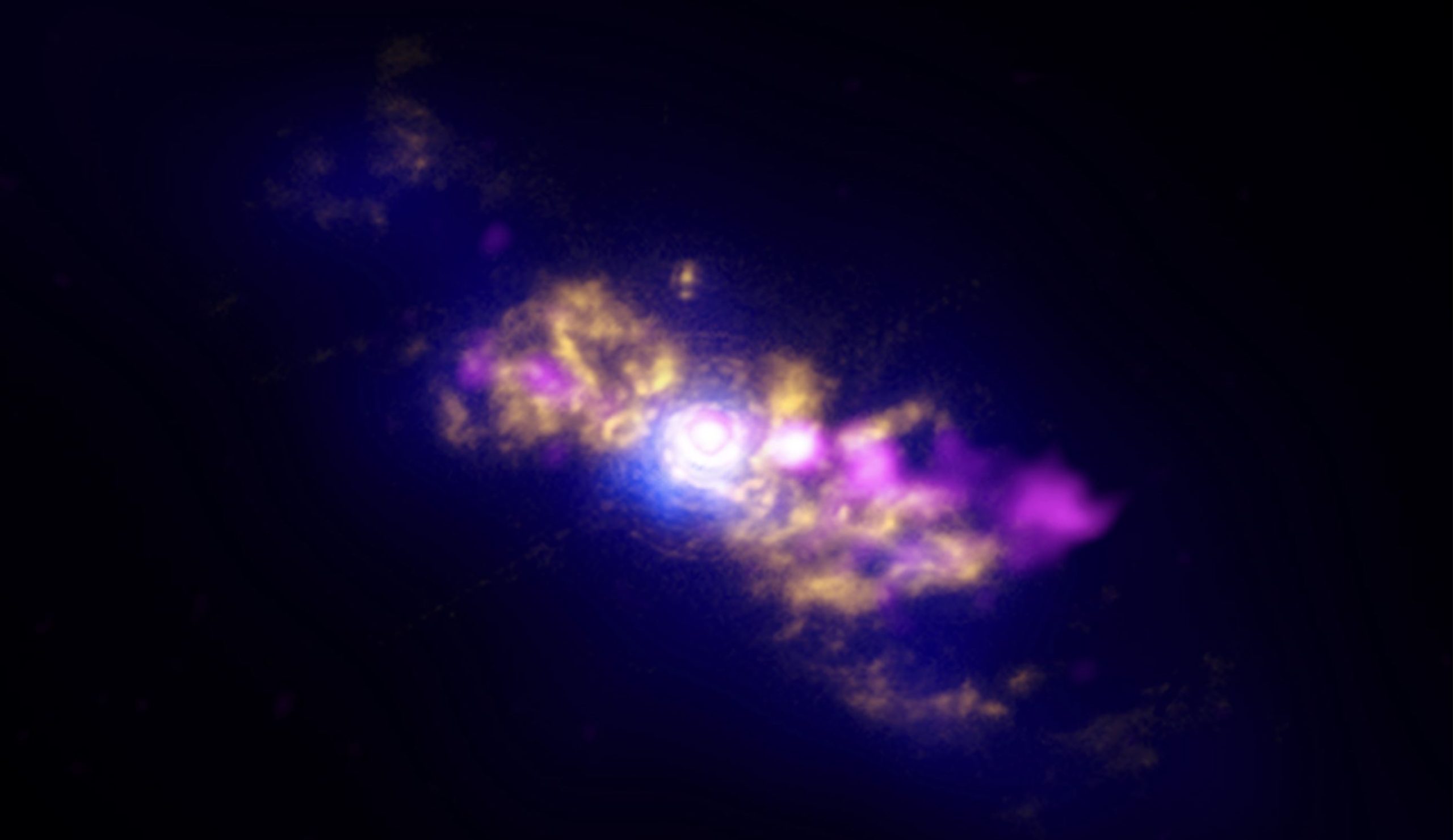 NGC 4151's central region can be seen in a combination of wavelengths. The image spans a distance of 2,000 light-years. [NASA/CXC/CfA/J.Wang et al.; Isaac Newton Group of Telescopes, La Palma/Jacobus Kapteyn Telescope; NS]