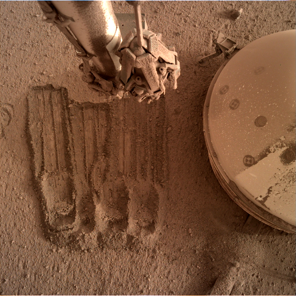 A robotic arm of InSight seen in this photograph. Image Credit: NASA.