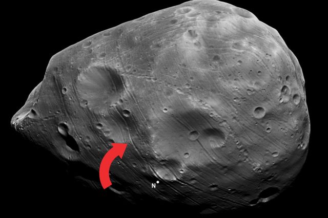 A photograph of Phobos and its tracks. Image Credit: NASA.
