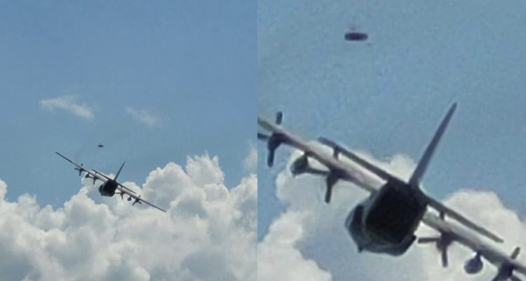 Photograph taken by Charles Morose showing a coast guard plane chasing a UFO. Image credit: Charles Morose/Sun.