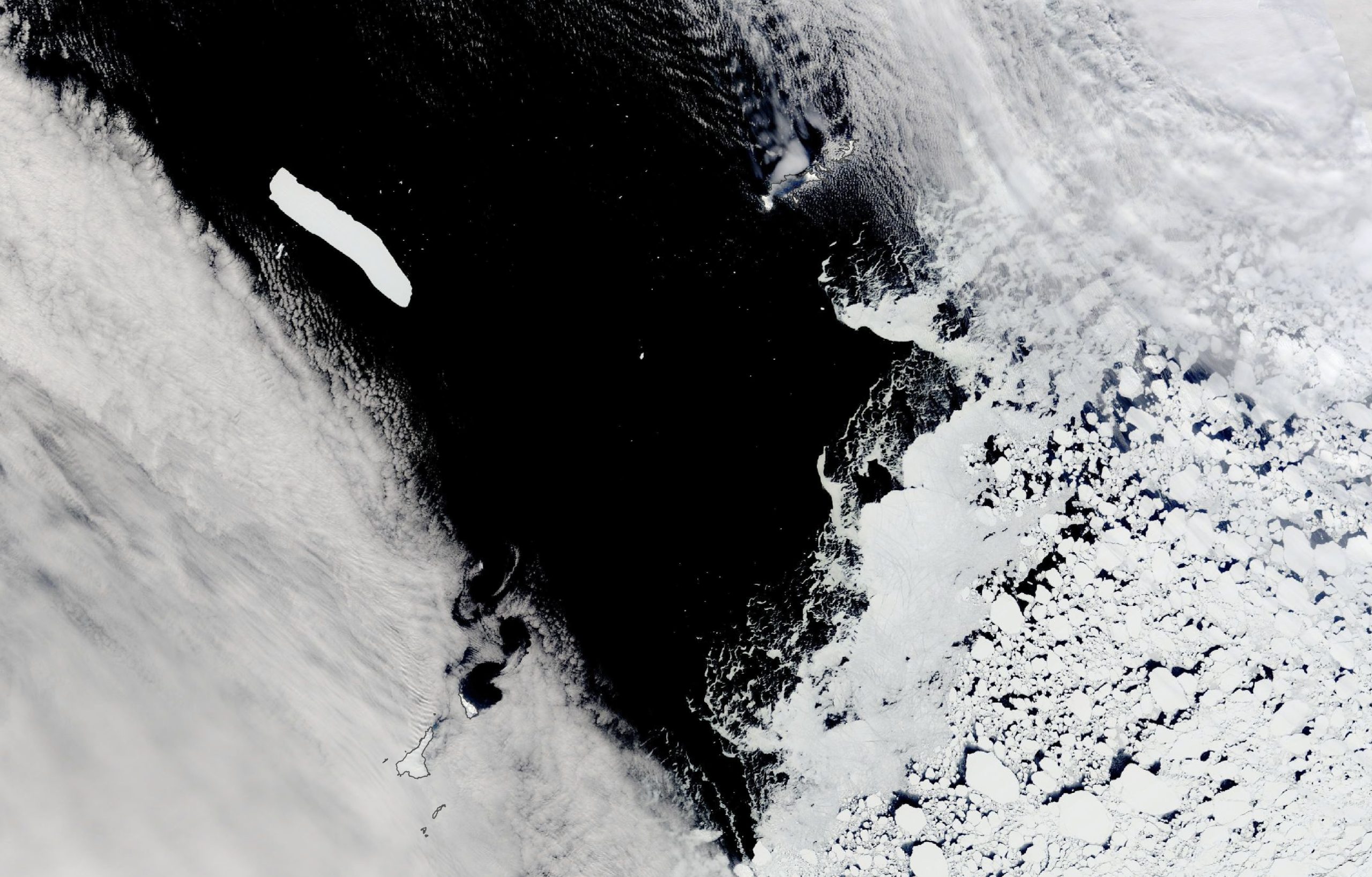 A satellite view of the iceberg. Image Credit: A satellite image showing the iceberg and island with annotations. Image Credit: NASA Earth Observatory images by Lauren Dauphin, using MODIS data from NASA EOSDIS LANCE and GIBS/Worldview.