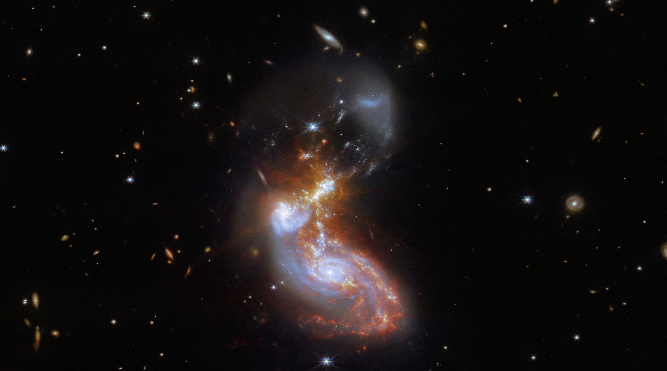 500 million light-years from Earth, these two galaxies are colliding. Image Credit: ESA/Webb, NASA & CSA, L. Armus, A. Evans.
