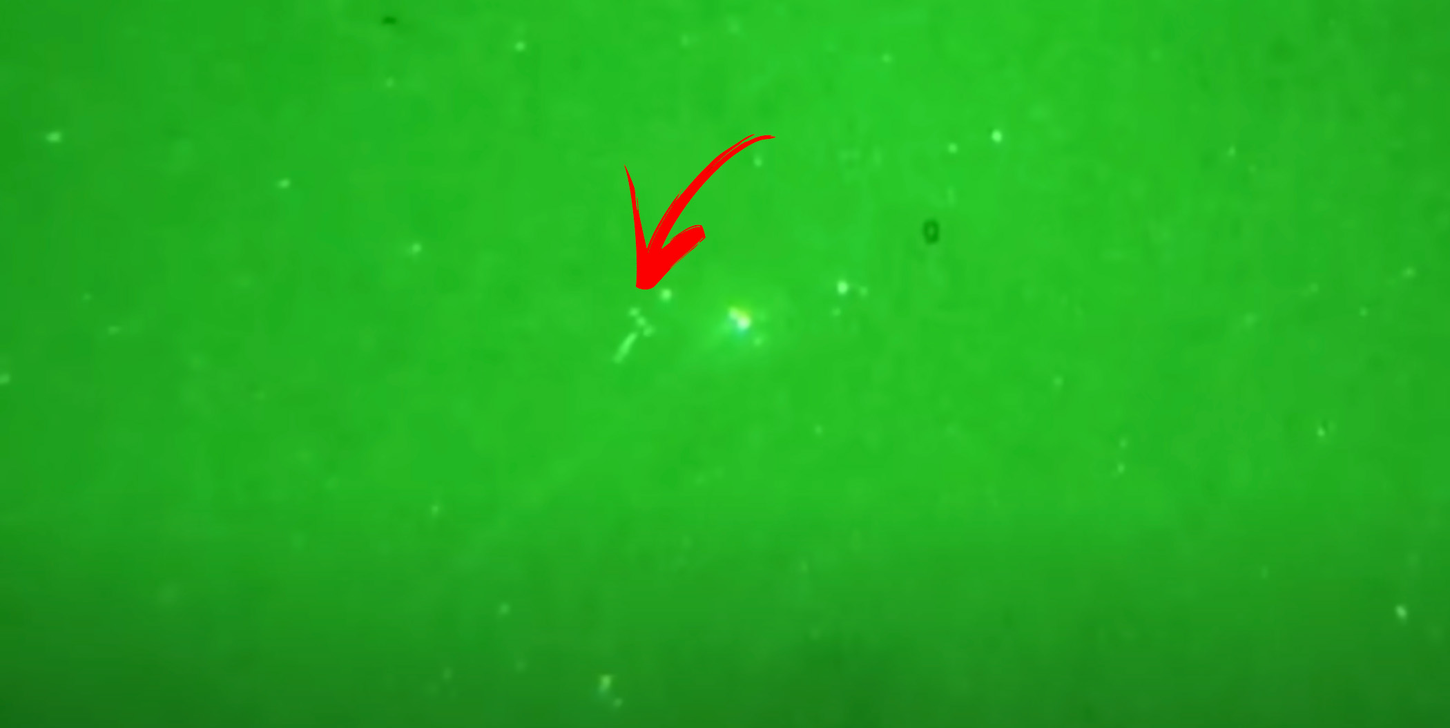 A screenshot with annotations showing the t-shaped UFO. YouTube.