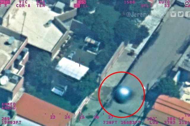 A screenshot of the spherical UFO snapped by a US Spy plane over Iraq. Image Credit: Jeremy Corbell.