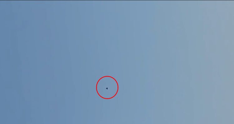 An alleged photograph of the UFO above Lake Huron. Twitter.