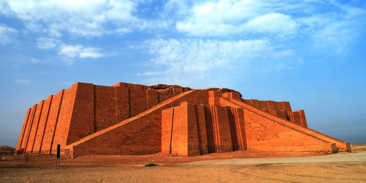 Restored ziggurat in ancient Ur, sumerian temple, Iraq. YAYIMAGES.