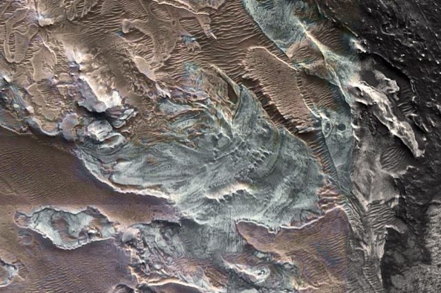 A photograph of a relict glacier on the surface of Mars. Credit: NASA MRO HiRISE and CRISM false color composite. Lee et al. 2023.
